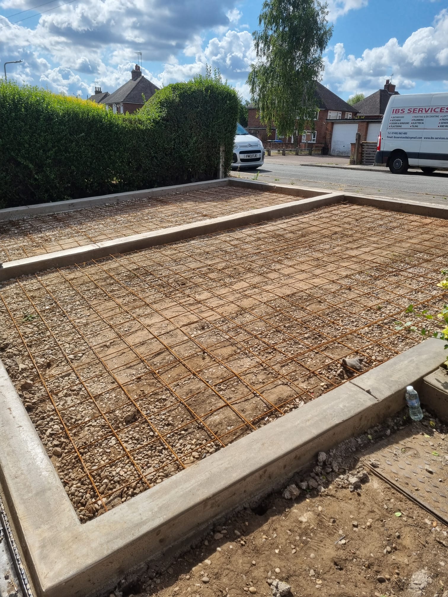 IBS Services van at a construction project site in Mansfield