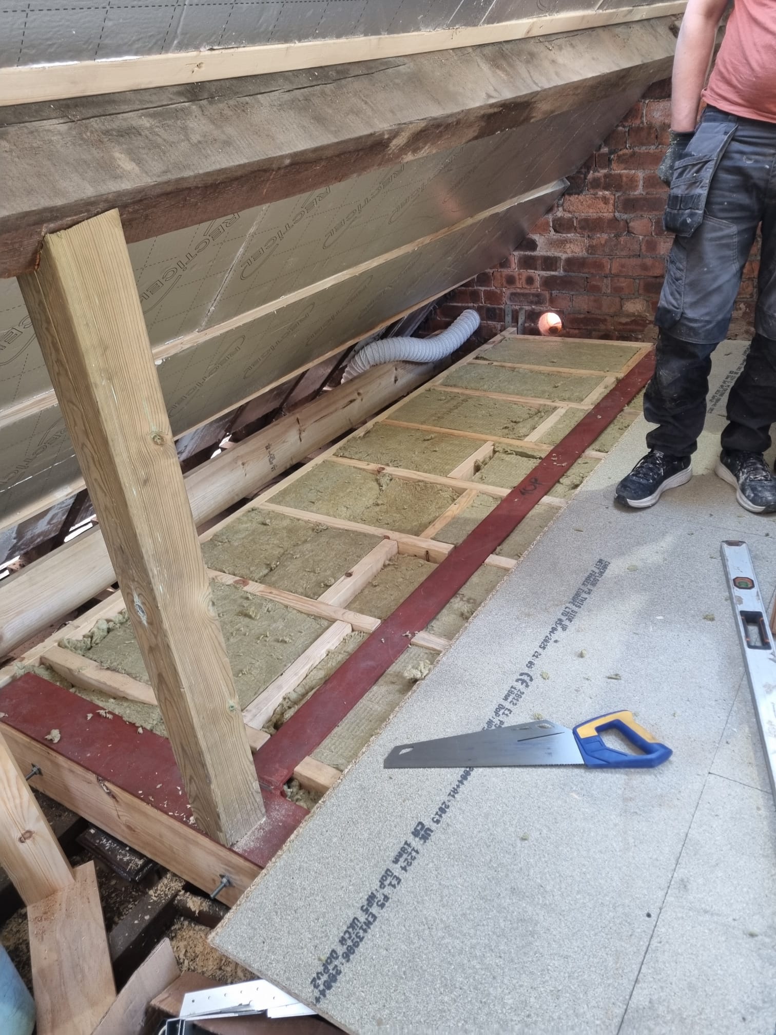 Loft conversion in progress showing insulation and structural work in Mansfield